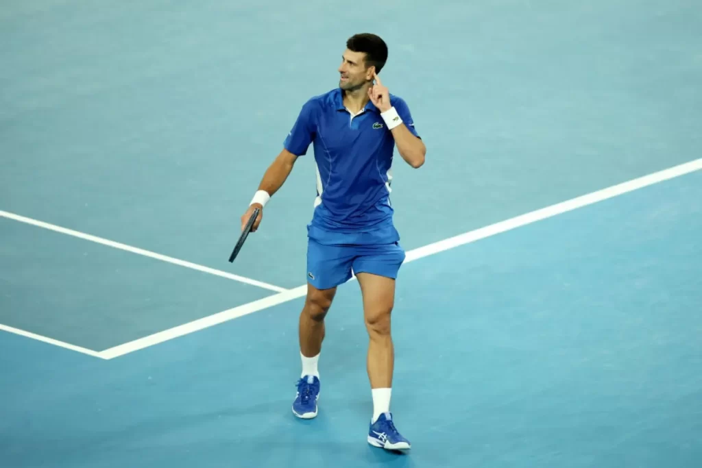 Witness: Heckler taunts Novak Djokovic by yelling "get vaccinated mate"